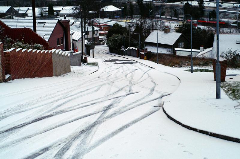 PICT0019a In order to get out, I have to go down that 1 in 6 hill! Look at the skid marks left by one who tried!